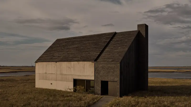 Kiln House, a concrete and charred timber house on the Suffolk marsh